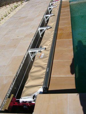 Mechanism, roller and cover fitted to pit
